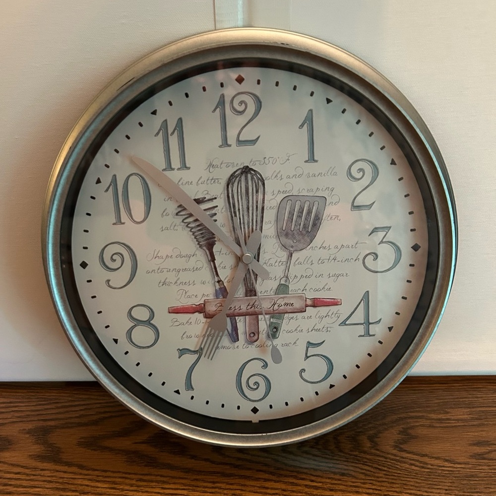 Elegant Silver Kitchen Wall Clock with Utensil Motif